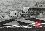 Image of Wounded transferred, ship-to-ship, on Stokes stretcher Mariana Islands, 1944, second 20 stock footage video 65675062229