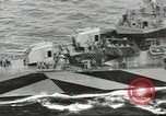 Image of Wounded transferred, ship-to-ship, on Stokes stretcher Mariana Islands, 1944, second 23 stock footage video 65675062229