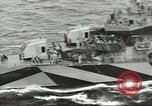 Image of Wounded transferred, ship-to-ship, on Stokes stretcher Mariana Islands, 1944, second 24 stock footage video 65675062229