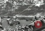 Image of Wounded transferred, ship-to-ship, on Stokes stretcher Mariana Islands, 1944, second 26 stock footage video 65675062229
