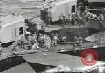 Image of Wounded transferred, ship-to-ship, on Stokes stretcher Mariana Islands, 1944, second 35 stock footage video 65675062229