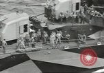 Image of Wounded transferred, ship-to-ship, on Stokes stretcher Mariana Islands, 1944, second 37 stock footage video 65675062229