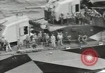 Image of Wounded transferred, ship-to-ship, on Stokes stretcher Mariana Islands, 1944, second 39 stock footage video 65675062229