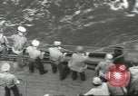 Image of Wounded transferred, ship-to-ship, on Stokes stretcher Mariana Islands, 1944, second 42 stock footage video 65675062229