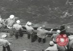 Image of Wounded transferred, ship-to-ship, on Stokes stretcher Mariana Islands, 1944, second 43 stock footage video 65675062229
