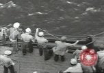 Image of Wounded transferred, ship-to-ship, on Stokes stretcher Mariana Islands, 1944, second 44 stock footage video 65675062229