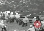 Image of Wounded transferred, ship-to-ship, on Stokes stretcher Mariana Islands, 1944, second 45 stock footage video 65675062229