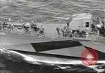 Image of Wounded transferred, ship-to-ship, on Stokes stretcher Mariana Islands, 1944, second 46 stock footage video 65675062229