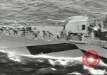 Image of Wounded transferred, ship-to-ship, on Stokes stretcher Mariana Islands, 1944, second 47 stock footage video 65675062229