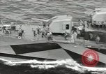 Image of Wounded transferred, ship-to-ship, on Stokes stretcher Mariana Islands, 1944, second 50 stock footage video 65675062229