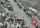Image of Wounded transferred, ship-to-ship, on Stokes stretcher Mariana Islands, 1944, second 53 stock footage video 65675062229