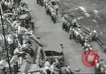 Image of Wounded transferred, ship-to-ship, on Stokes stretcher Mariana Islands, 1944, second 55 stock footage video 65675062229