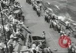 Image of Wounded transferred, ship-to-ship, on Stokes stretcher Mariana Islands, 1944, second 56 stock footage video 65675062229