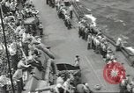 Image of Wounded transferred, ship-to-ship, on Stokes stretcher Mariana Islands, 1944, second 58 stock footage video 65675062229