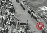Image of Wounded transferred, ship-to-ship, on Stokes stretcher Mariana Islands, 1944, second 60 stock footage video 65675062229