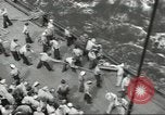 Image of Wounded transferred, ship-to-ship, on Stokes stretcher Mariana Islands, 1944, second 61 stock footage video 65675062229