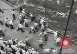 Image of Wounded transferred, ship-to-ship, on Stokes stretcher Mariana Islands, 1944, second 62 stock footage video 65675062229