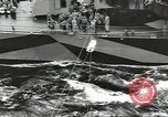 Image of Transferring wounded between ships on Stokes stretcher Mariana Islands, 1944, second 3 stock footage video 65675062231