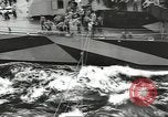 Image of Transferring wounded between ships on Stokes stretcher Mariana Islands, 1944, second 7 stock footage video 65675062231