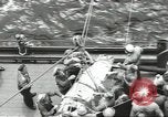 Image of Transferring wounded between ships on Stokes stretcher Mariana Islands, 1944, second 8 stock footage video 65675062231