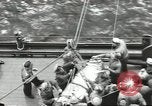 Image of Transferring wounded between ships on Stokes stretcher Mariana Islands, 1944, second 9 stock footage video 65675062231