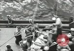 Image of Transferring wounded between ships on Stokes stretcher Mariana Islands, 1944, second 10 stock footage video 65675062231