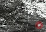 Image of Transferring wounded between ships on Stokes stretcher Mariana Islands, 1944, second 12 stock footage video 65675062231