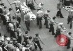 Image of Transferring wounded between ships on Stokes stretcher Mariana Islands, 1944, second 18 stock footage video 65675062231