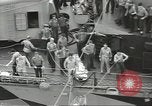 Image of Transferring wounded between ships on Stokes stretcher Mariana Islands, 1944, second 20 stock footage video 65675062231