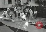 Image of Transferring wounded between ships on Stokes stretcher Mariana Islands, 1944, second 23 stock footage video 65675062231