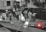 Image of Transferring wounded between ships on Stokes stretcher Mariana Islands, 1944, second 25 stock footage video 65675062231
