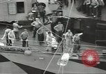 Image of Transferring wounded between ships on Stokes stretcher Mariana Islands, 1944, second 27 stock footage video 65675062231