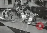 Image of Transferring wounded between ships on Stokes stretcher Mariana Islands, 1944, second 29 stock footage video 65675062231