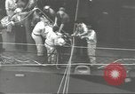 Image of Transferring wounded between ships on Stokes stretcher Mariana Islands, 1944, second 30 stock footage video 65675062231