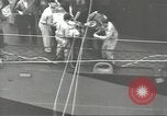 Image of Transferring wounded between ships on Stokes stretcher Mariana Islands, 1944, second 32 stock footage video 65675062231