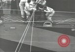 Image of Transferring wounded between ships on Stokes stretcher Mariana Islands, 1944, second 33 stock footage video 65675062231