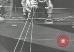 Image of Transferring wounded between ships on Stokes stretcher Mariana Islands, 1944, second 34 stock footage video 65675062231