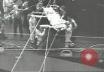 Image of Transferring wounded between ships on Stokes stretcher Mariana Islands, 1944, second 39 stock footage video 65675062231