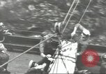 Image of Transferring wounded between ships on Stokes stretcher Mariana Islands, 1944, second 47 stock footage video 65675062231