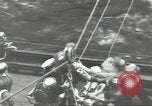 Image of Transferring wounded between ships on Stokes stretcher Mariana Islands, 1944, second 51 stock footage video 65675062231