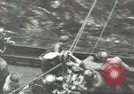 Image of Transferring wounded between ships on Stokes stretcher Mariana Islands, 1944, second 52 stock footage video 65675062231