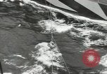 Image of Transferring wounded between ships on Stokes stretcher Mariana Islands, 1944, second 53 stock footage video 65675062231
