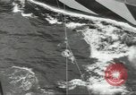 Image of Transferring wounded between ships on Stokes stretcher Mariana Islands, 1944, second 54 stock footage video 65675062231