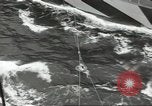 Image of Transferring wounded between ships on Stokes stretcher Mariana Islands, 1944, second 56 stock footage video 65675062231