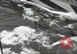 Image of Transferring wounded between ships on Stokes stretcher Mariana Islands, 1944, second 57 stock footage video 65675062231
