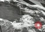 Image of Transferring wounded between ships on Stokes stretcher Mariana Islands, 1944, second 58 stock footage video 65675062231