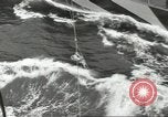 Image of Transferring wounded between ships on Stokes stretcher Mariana Islands, 1944, second 59 stock footage video 65675062231