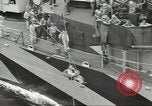 Image of Transferring wounded between ships on Stokes stretcher Mariana Islands, 1944, second 62 stock footage video 65675062231