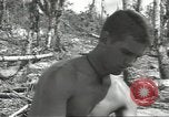 Standbild USA Soldaten einrichten Positionen auf Guam Guam Marianen, 1944, aus Sekunde 53 historischem Filmmaterial Videoclip 65675062232