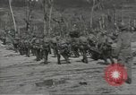 Image of United States soldiers establishing positions on Guam Guam Mariana Islands, 1944, second 62 stock footage video 65675062233